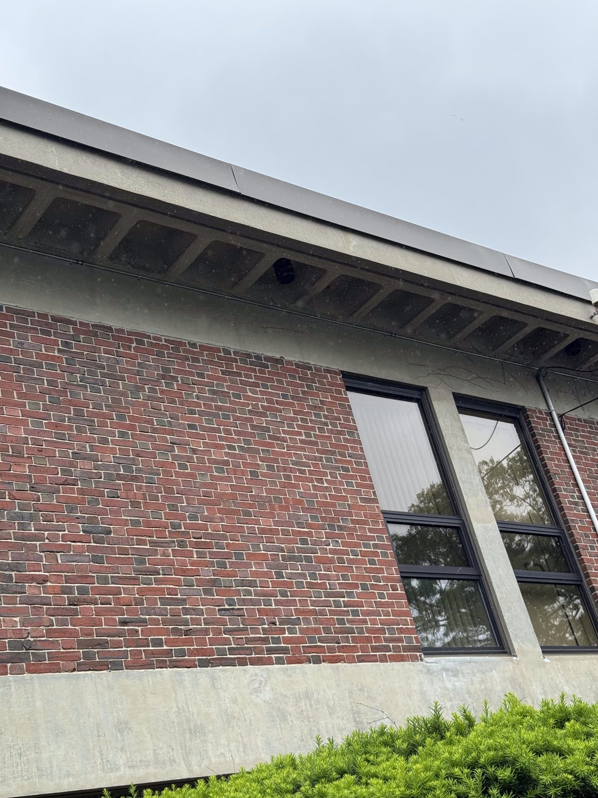 Exterior lighting installation on a commercial brick building